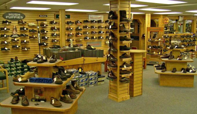 Comodo ispiri gli espositori di legno della scarpa da tennis degli scaffali di esposizione del negozio di scarpe
