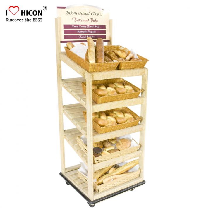 Pavimento al minuto che sta il banco di mostra di legno del pane per il deposito del forno/negozi di alimento